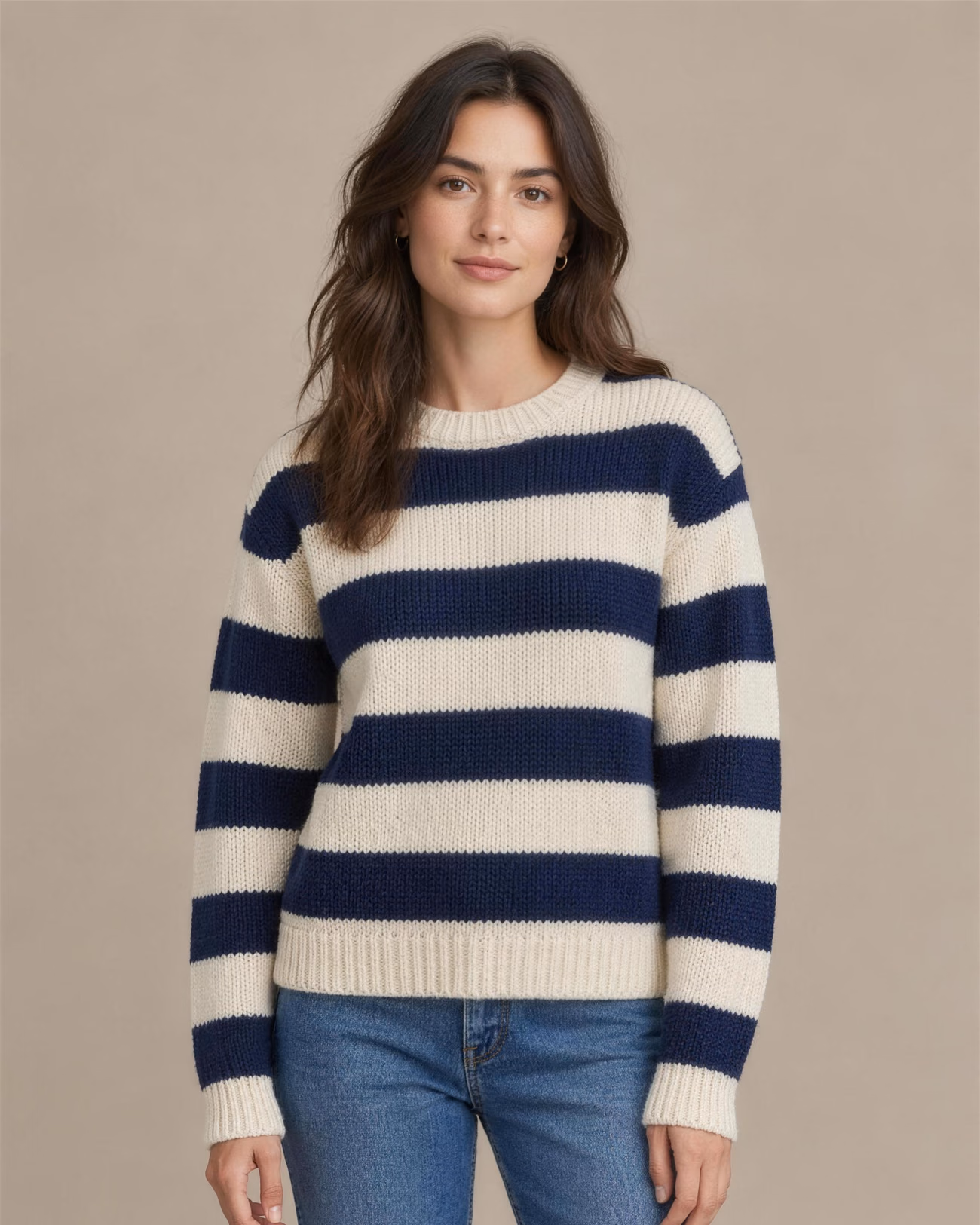 Wide shot: Knit sweater with wide block stripes in navy and cream